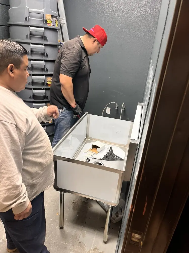 Commercial plumbing and sink installation in Ferris